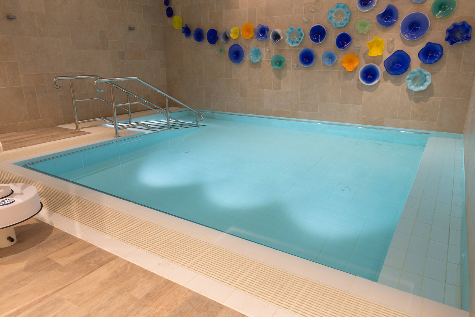 Warm-water pool and decorative wall, Bayswater Gardens