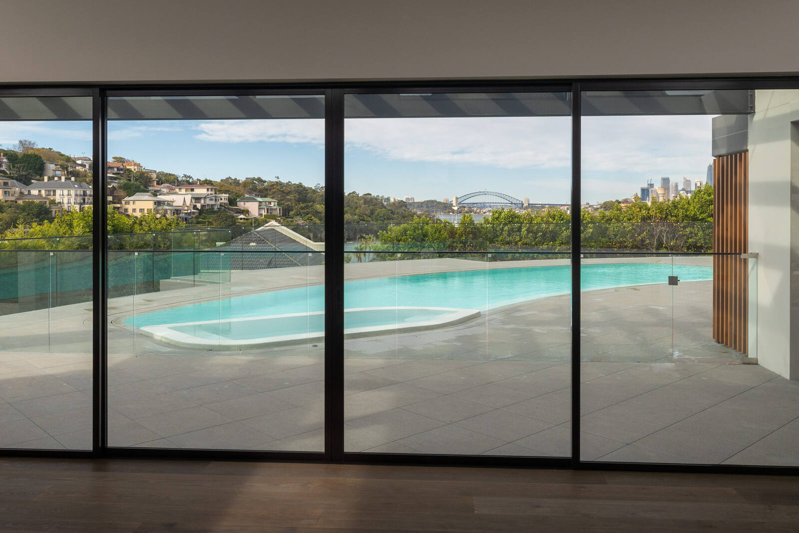 Pulpit Point Residence pool viewed through the glass doors from inside, Pulpit Point
