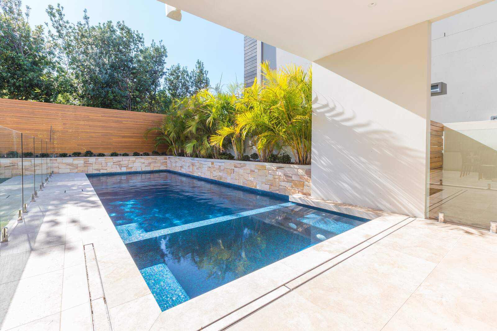 Gupta Residence pool, sandstone coping
