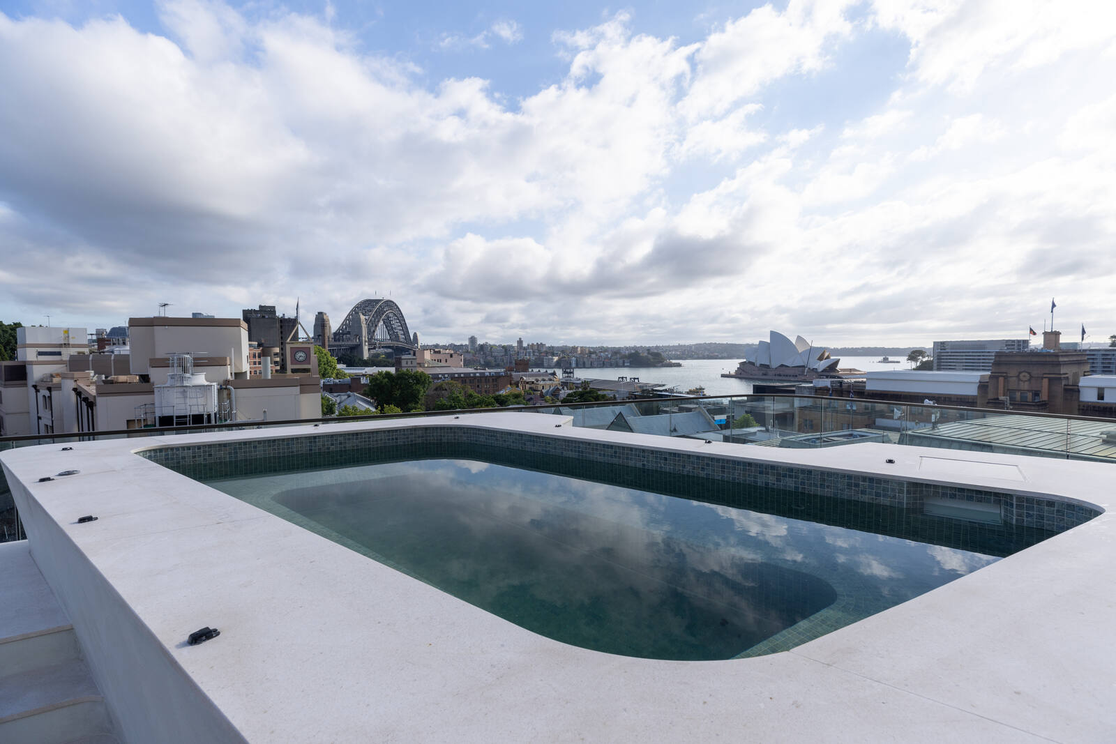 Rooftop pool looking over The Rocks to the Harbour Bridge and Opera House, Harrington Street