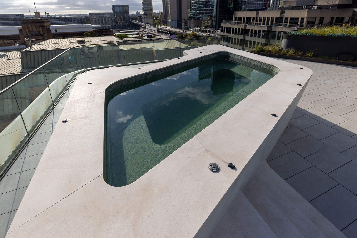 Sculptural free-form rooftop pool from above, Harrington Street, The Rocks