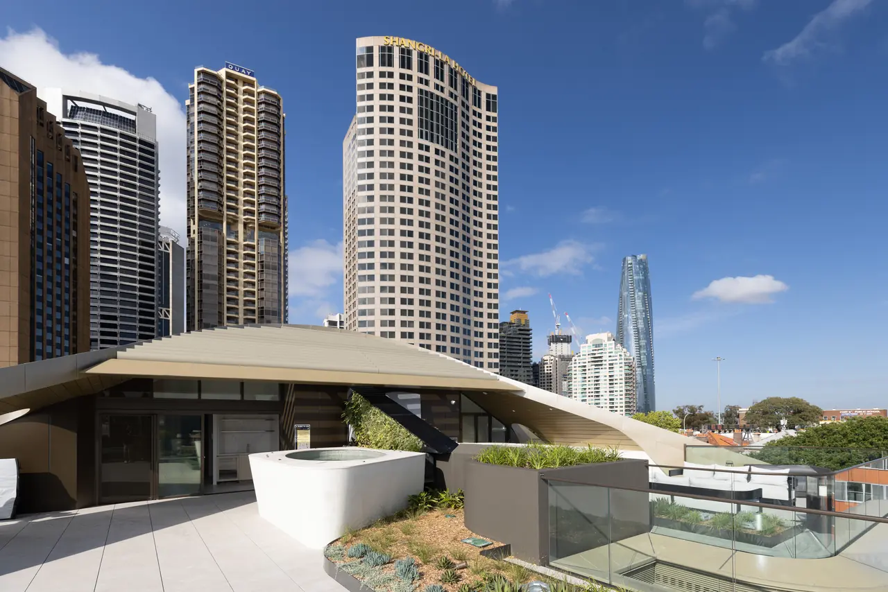Rooftop terrace with raised spa under the curved canopy, Harrington Street, The Rocks