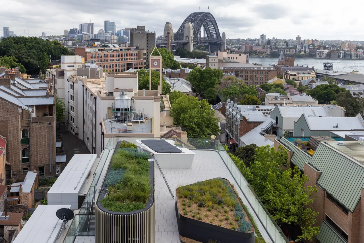 Rooftops of The Rocks from above, with the Harbour Bridge beyond