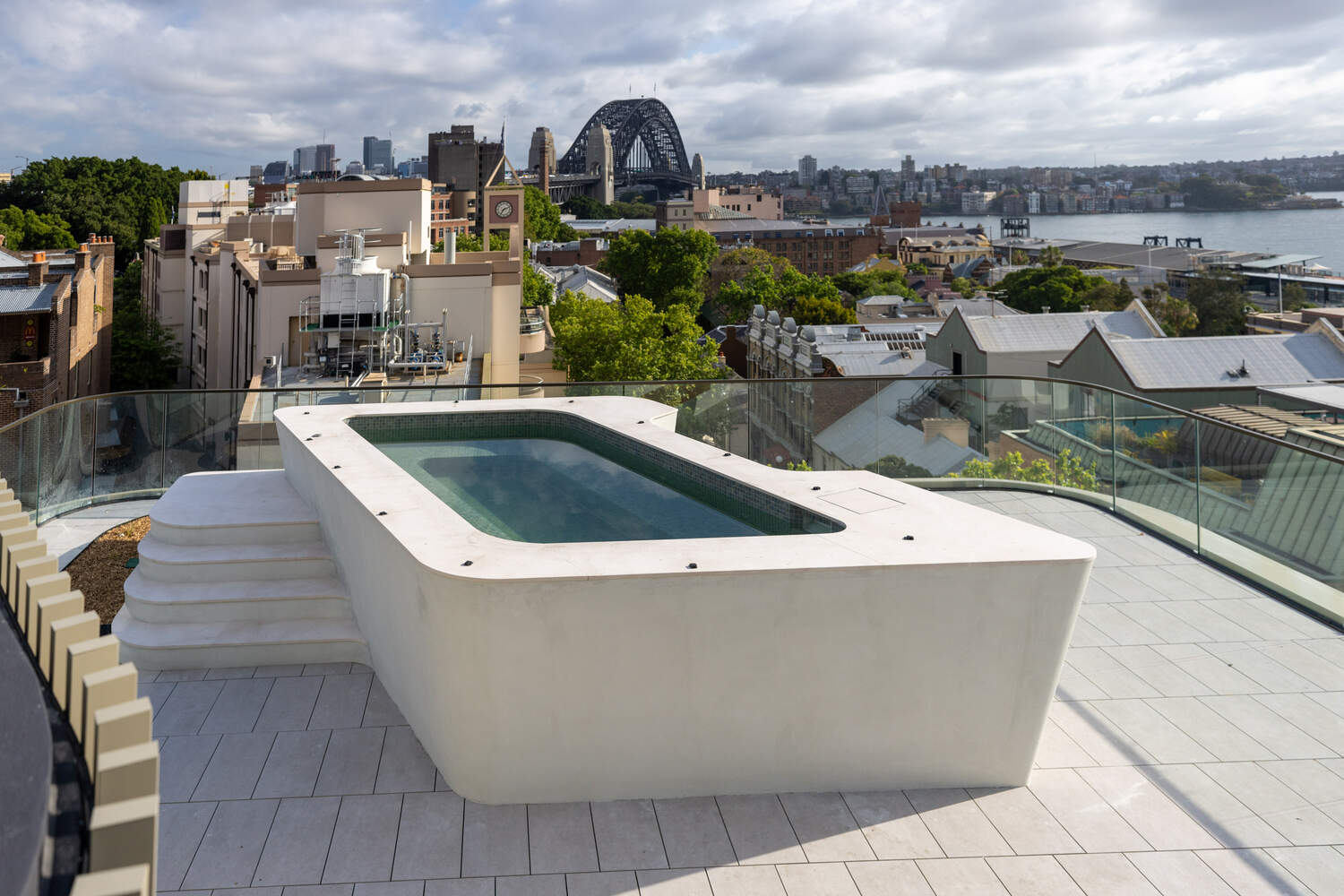 Sculptural rooftop pool with Harbour Bridge views, Harrington Street, The Rocks