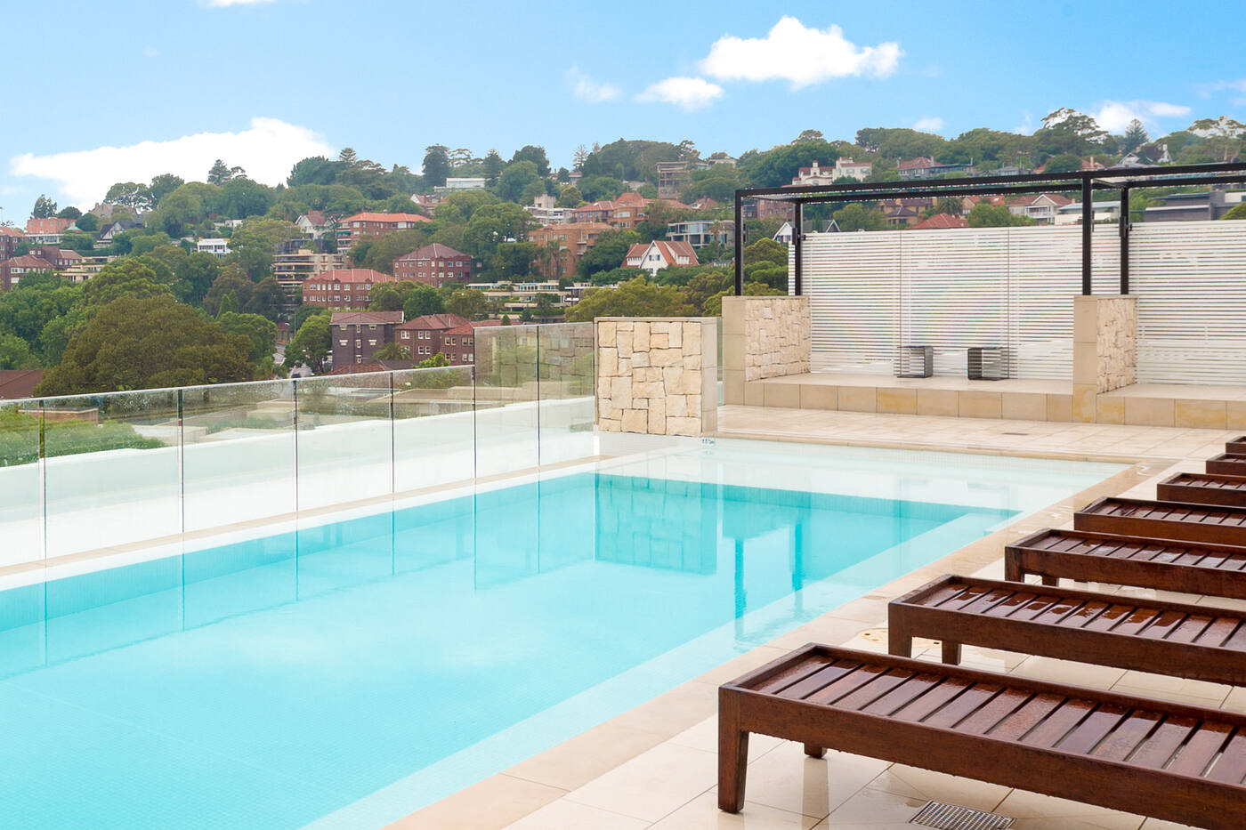 Pool, sandstone wall and view, InterContinental Sydney