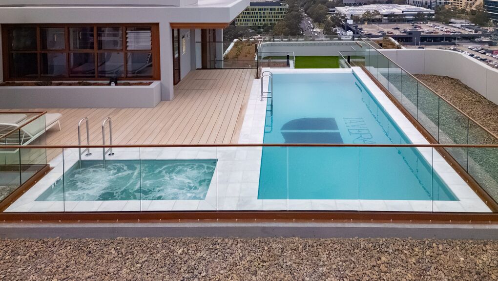 Rooftop lap pool and spa with glass balustrade, La Vera, Macquarie Park