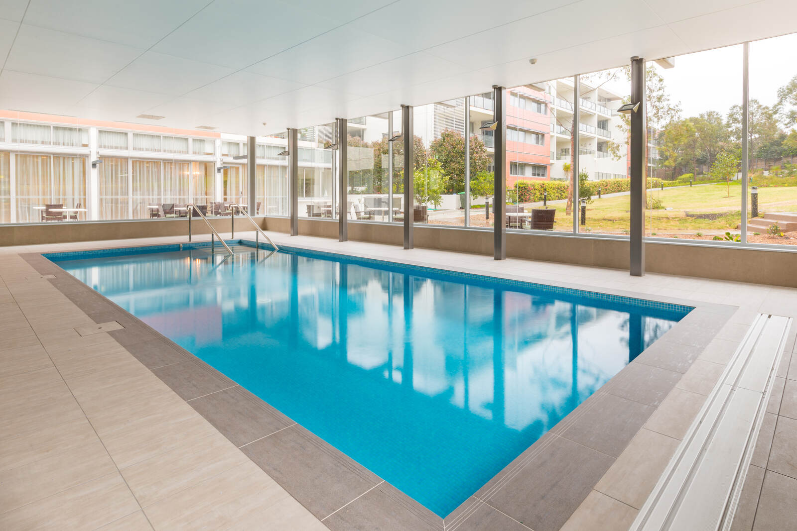Warm-water pool with garden outlook, Little Bay Retirement Village