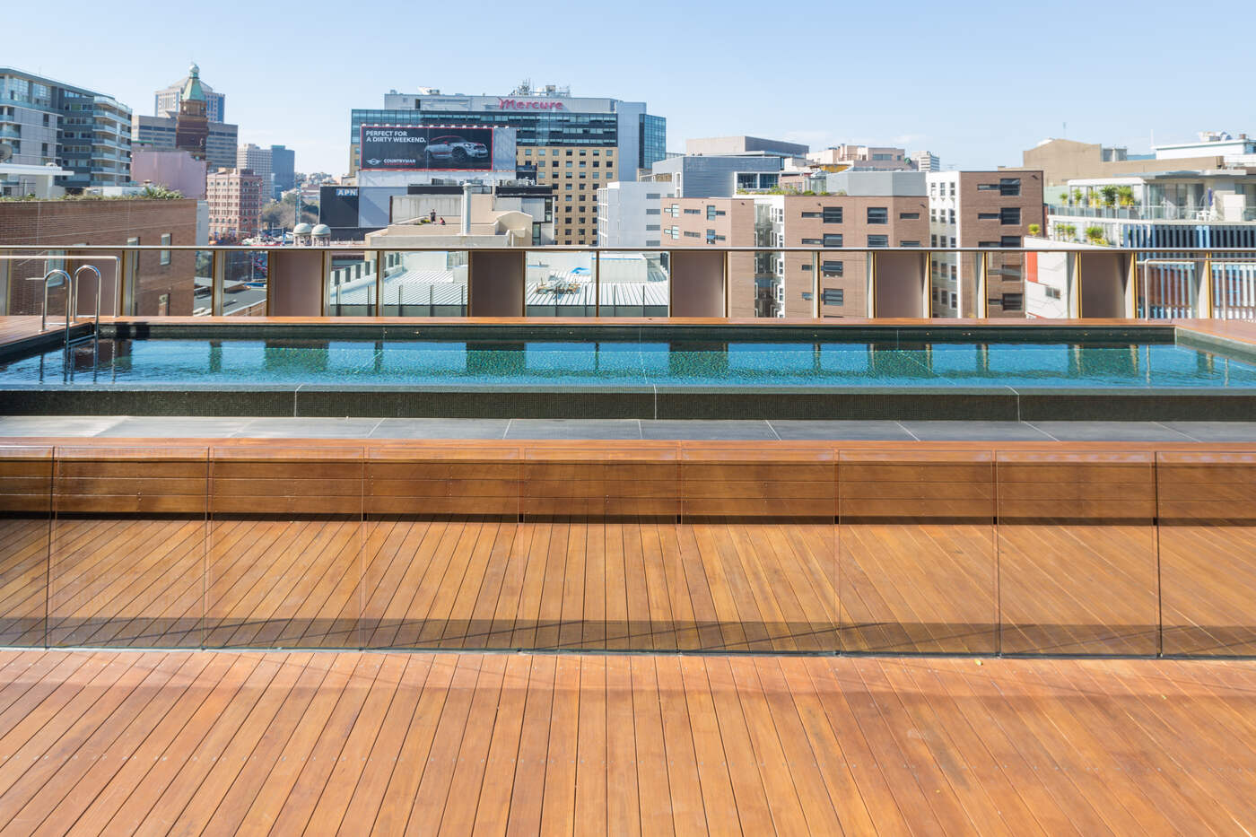 Rooftop pool and Sydney skyline, Old Clare Hotel