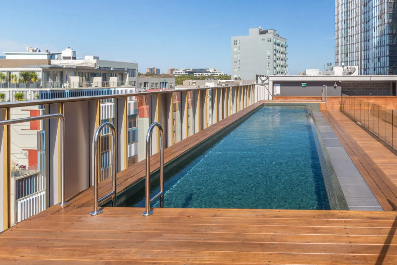 Rooftop pool and heritage facade, Old Clare Hotel