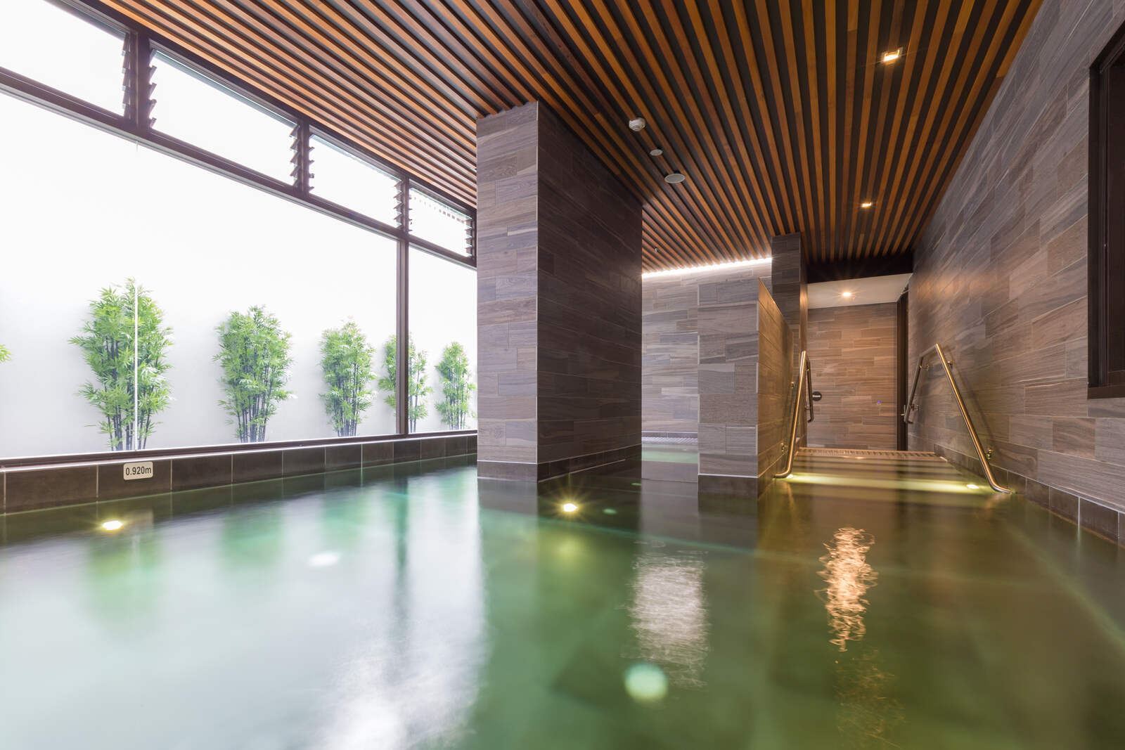 Spa corner with lit rail, Platinum Apartments Zetland