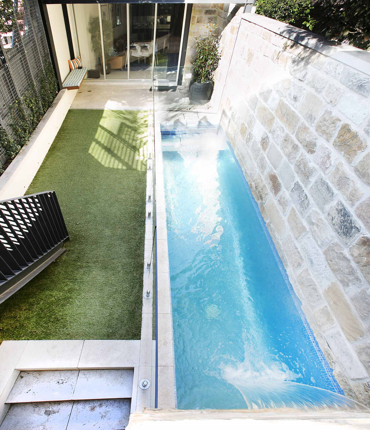 Profile Residence lap pool along the sandstone wall, Centennial Park