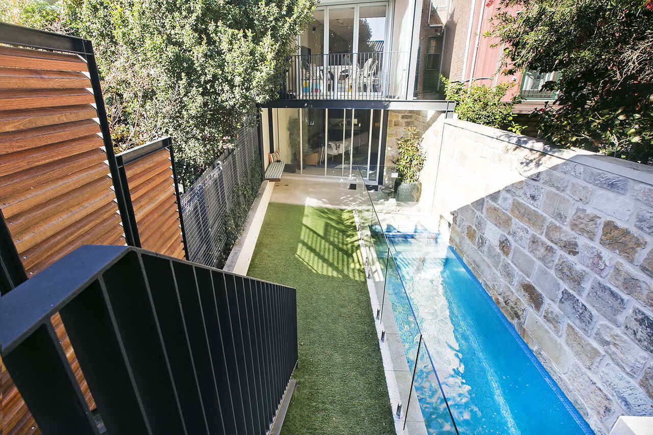 Profile Residence courtyard pool with glass fencing and lawn, Centennial Park