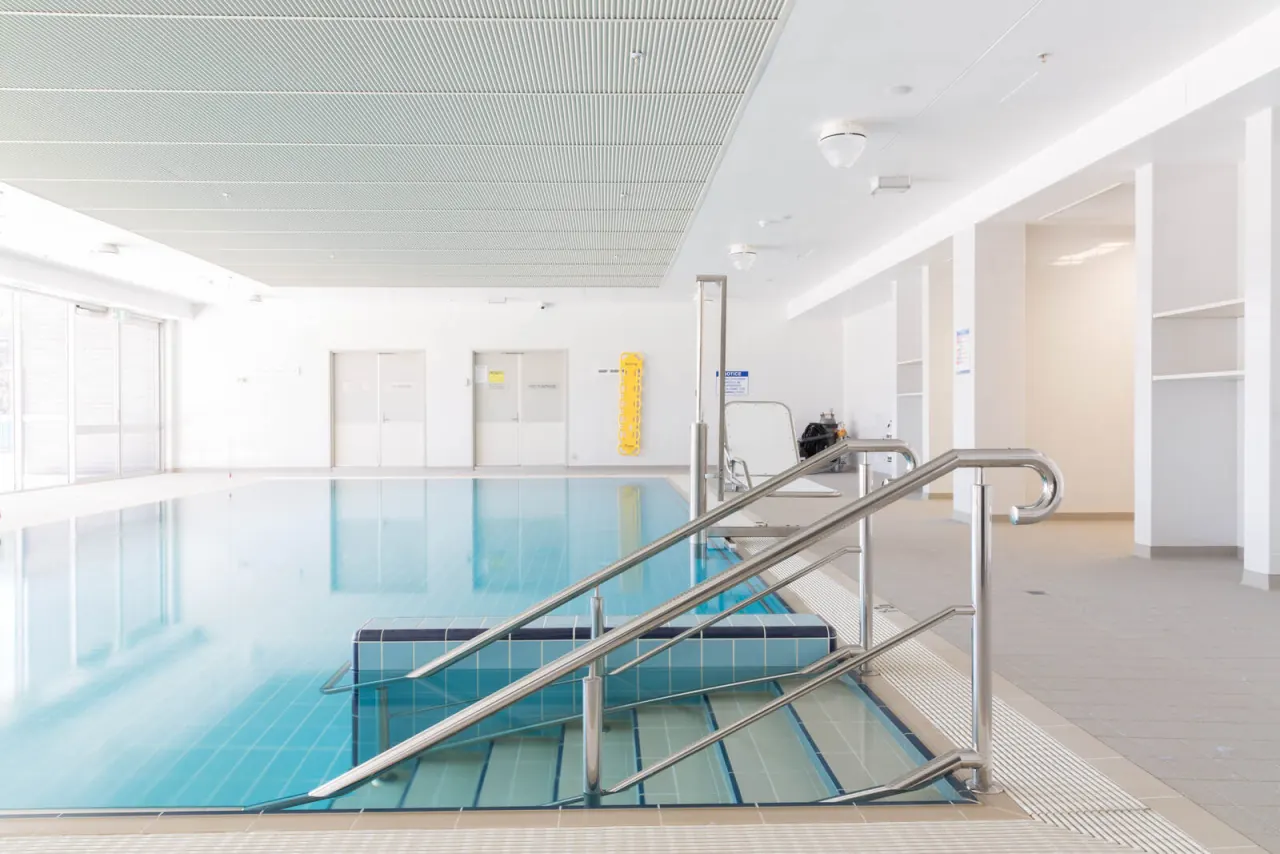 Bright pool hall with full-height windows, Ryde Hospital