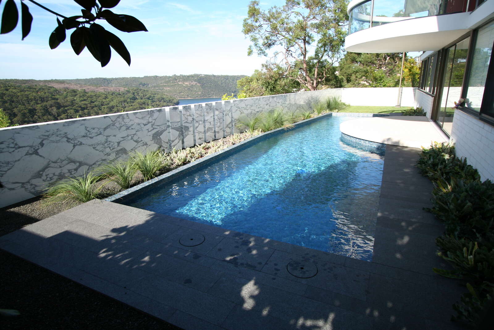 Scard Residence pool and lawn with the valley beyond, Castle Cove