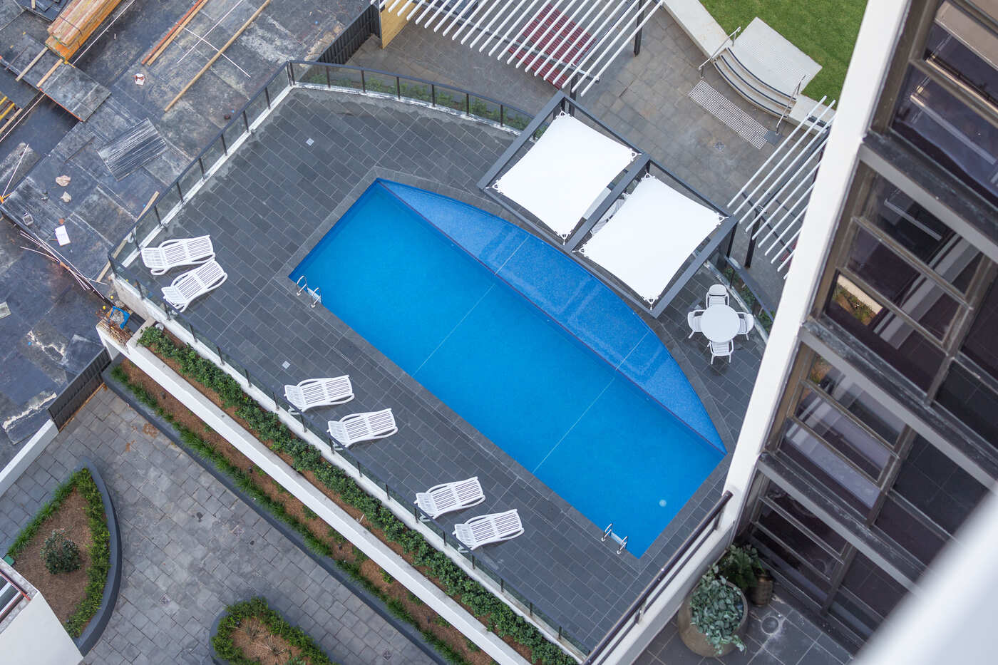 Aerial view of the communal pool and deck, Skyhaus Liverpool