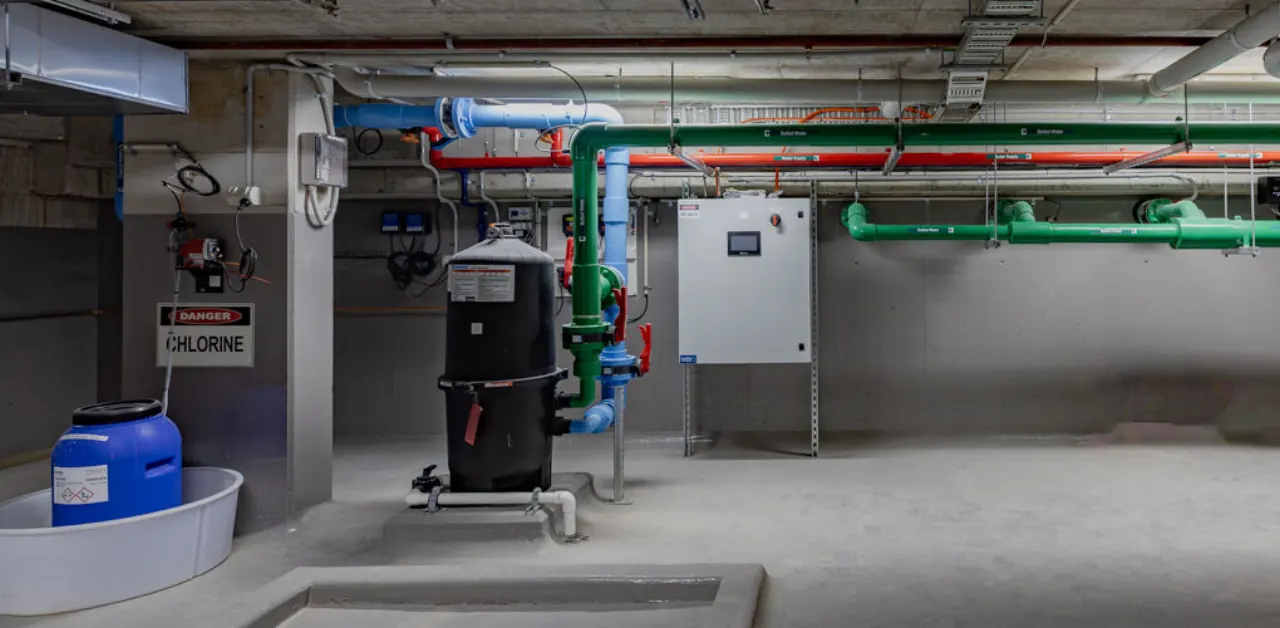 Filtration and control equipment in the plant room, Vela Apartments