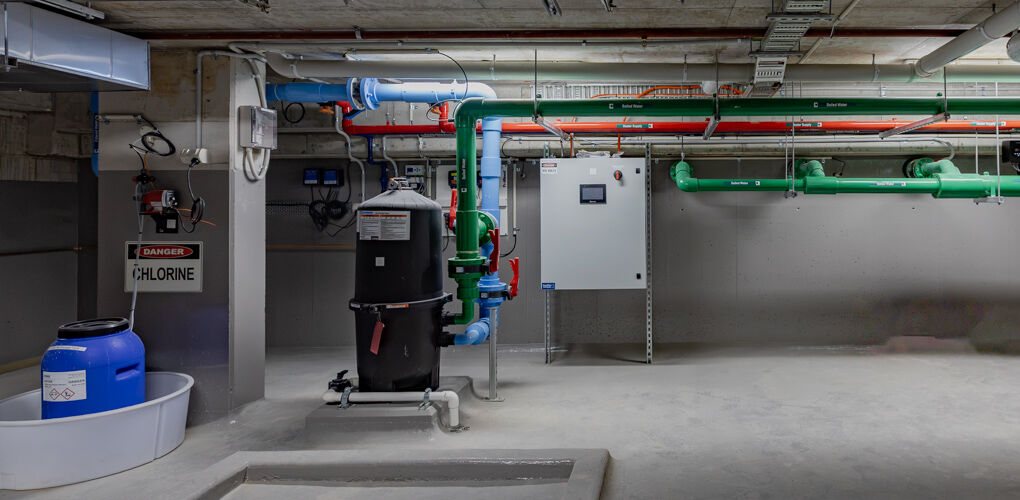 Filtration and control equipment in the plant room, Vela Apartments