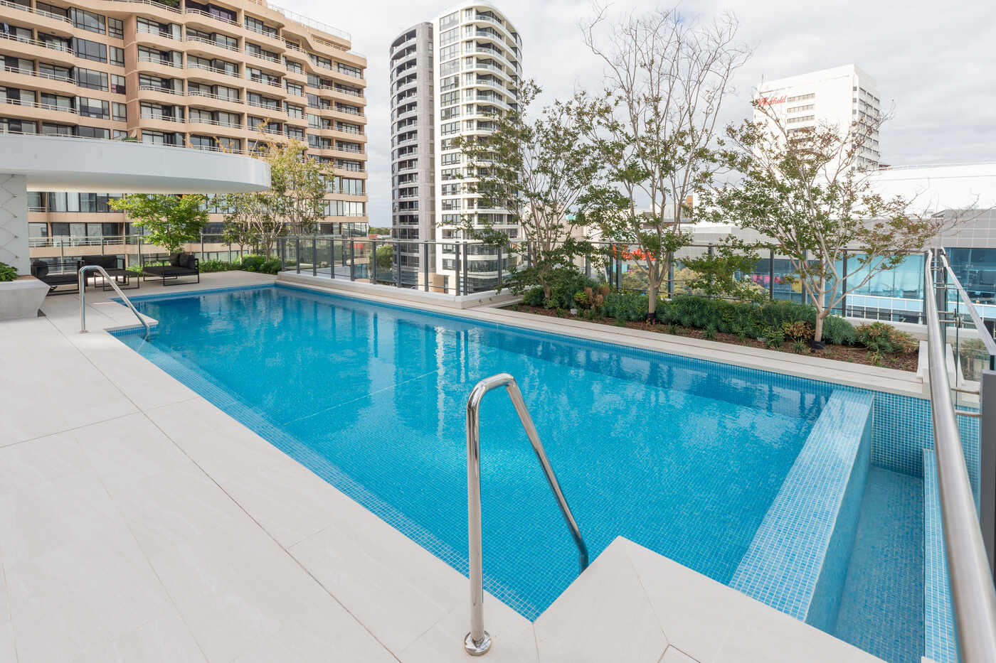 Podium pool and apartment outlook, Vue Bondi Junction