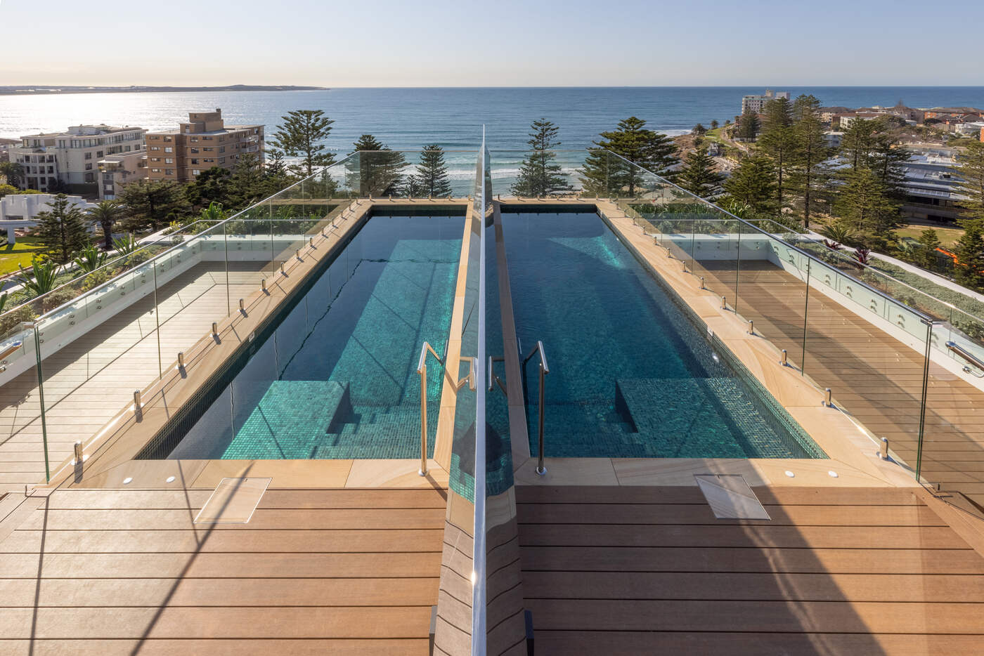 Penthouse pool, glass balustrade and beach view, Wavelengths Cronulla