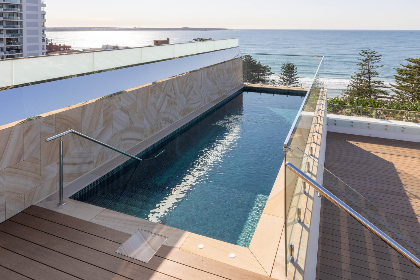 Pool and sandstone wall with ocean outlook, Wavelengths Cronulla