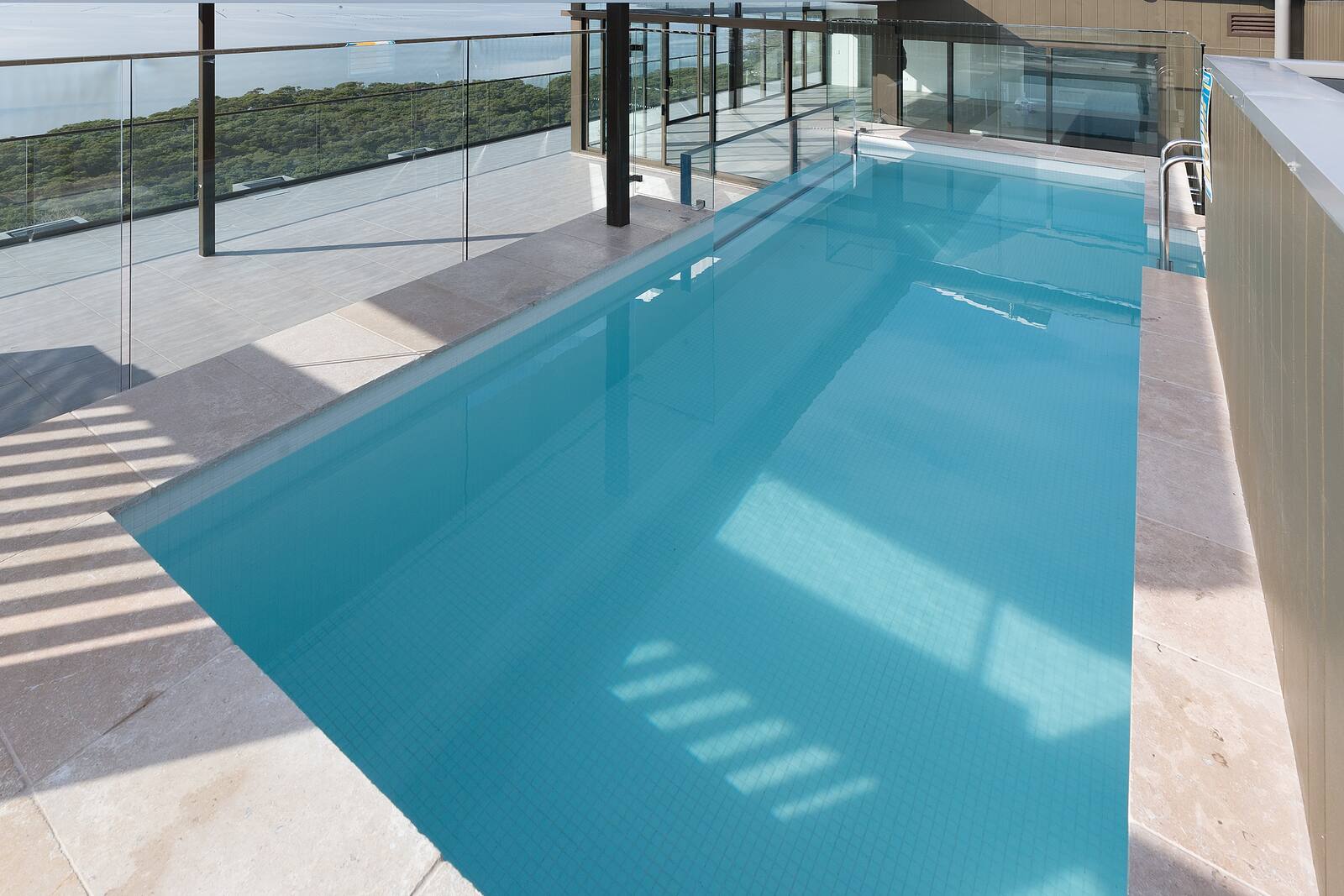 Rooftop lap pool with glass edge, Woolooware Bay
